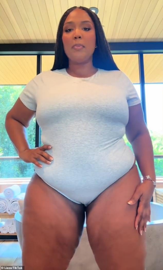 Lizzo, 36, continued to show off her dramatic weight loss as she gave her fans a glimpse of her toned figure in a new TikTok video uploaded on Thursday