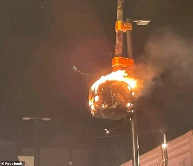 On New Year's Day 2022, the precious installation survived an arson attack when a burning firework was thrown at its base, engulfing the artwork in flames (photo)