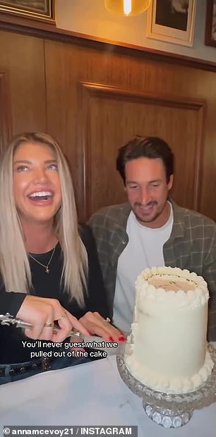 Anna and her husband posed on Instagram next to a burnt cake with vanilla icing