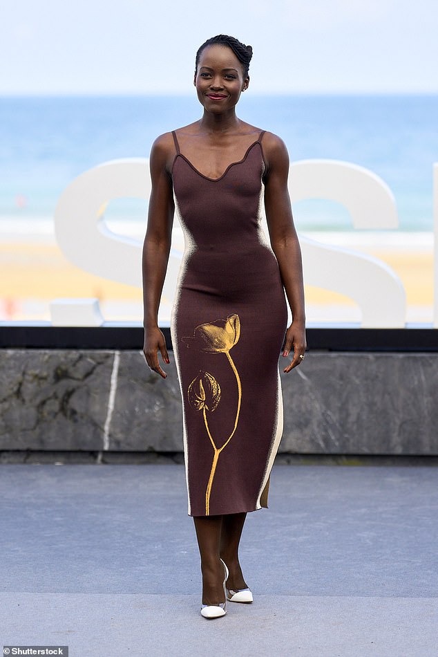 Lupita Nyong'o was the picture of class in a chocolate midi dress as the actress made a stylish appearance at The Wild Robot photocall during the San Sebastian International Film Festival in Spain