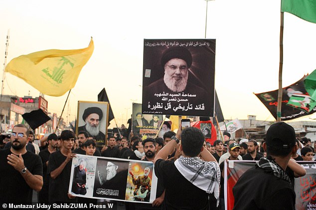 A march in Sadr City in Baghdad, Iraq, as people pay tribute to Hezbollah leader Sayyed Hassan Nasrallah, who was killed in an Israeli Air Force attack in Beirut