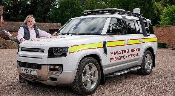 Exhibition: Ray with the mobile humanitarian museum housed in a British Red Cross Land Rover Defender