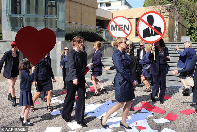 MONA trustee Kirsha Kaechele and her supporters are seen at the Supreme Court on Friday