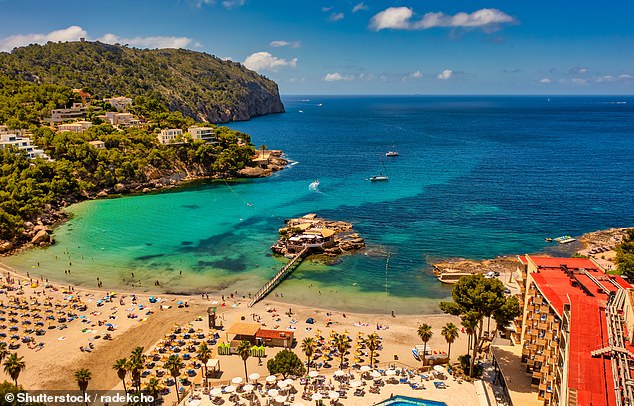 The holidaymaker's dress and underwear were torn when officers reached the car park of the Camp de Mar holiday resort on the southwest coast of Mallorca