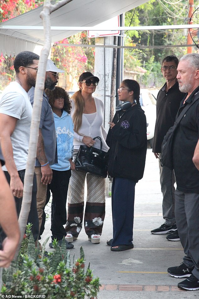 Mariah Carey treated her 13-year-old twin sister Moroccan and Monroe Cannon to dinner at Aprazível restaurant in Rio de Janeiro on Saturday ahead of her headlining performance at the 40th annual Rock in Rio Festival