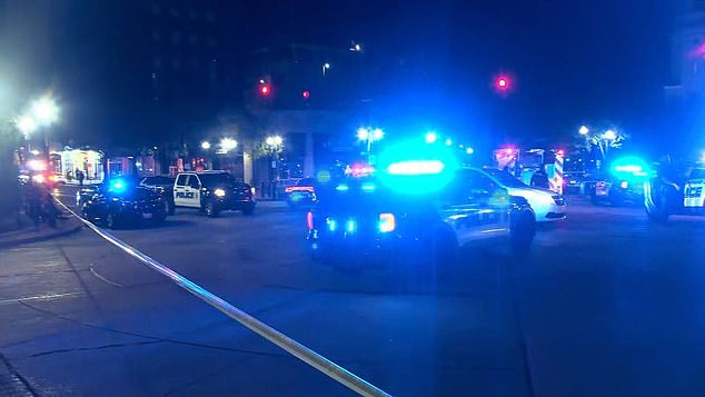 Birmingham Police vehicles near the scene where multiple people were shot Saturday night