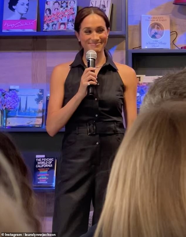 Pictured: Meghan Markle seen on stage during Oprah's book club event at Godmothers bookstore in Summerland on Friday