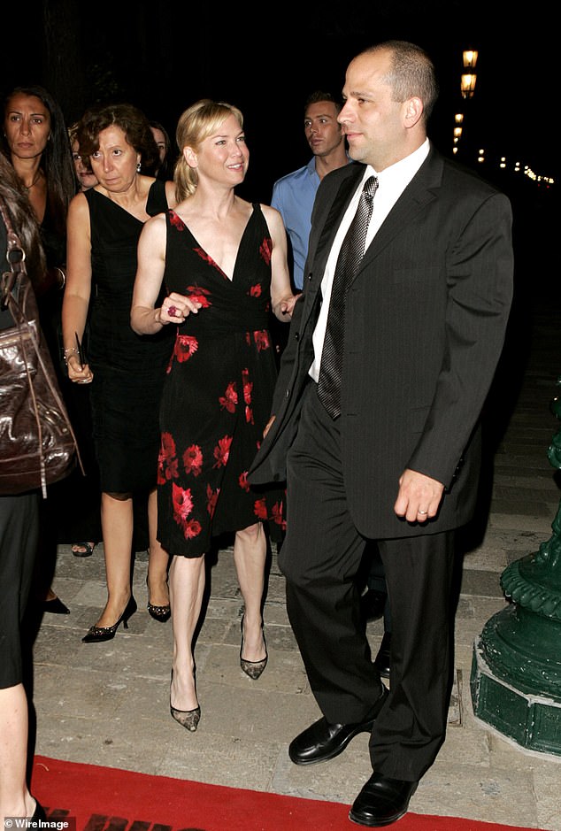 Renee Zellweger and Officer Brandt Joel at the 2005 Venice Film Festival. Mr. Joel is at the center of the storm because of a series of WhatsApp messages