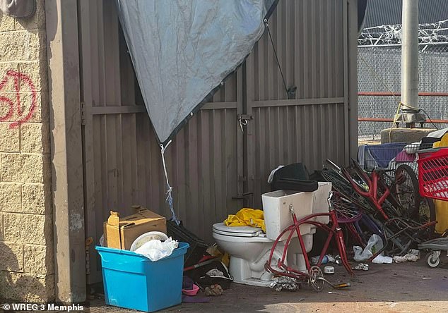 There are two toilet bowls and other junk at the Burger King, with the city claiming they are going to clean it up