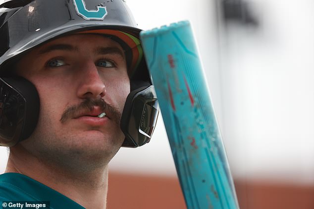 Derek Bender watches during one of his final college games with Coastal Carolina in April