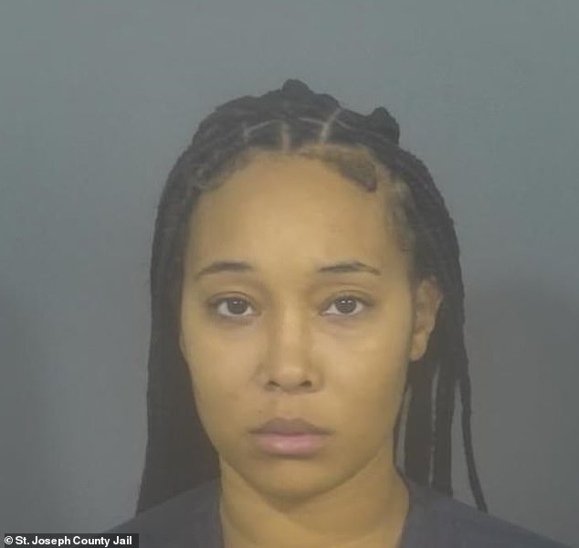 Jasmine White, 27, of South Bend, Indiana, was arrested on September 11 after allegedly driving away at a high rate of speed in her Chevy Equinox while her eight-year-old daughter grabbed the door handle and slammed her to the ground.