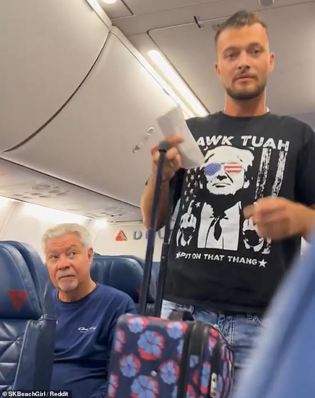 An angry MAGA supporter was removed from a Delta Airlines flight for wearing a shirt that featured Donald Trump giving the middle finger and a racy reference to the 