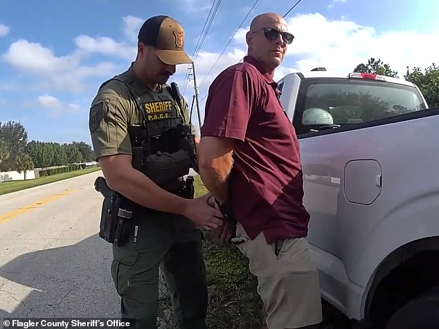 Hickerson's arrest was captured on a police body camera as he was ordered out of his white pickup truck by officers with the Flagler County Sheriff's Office