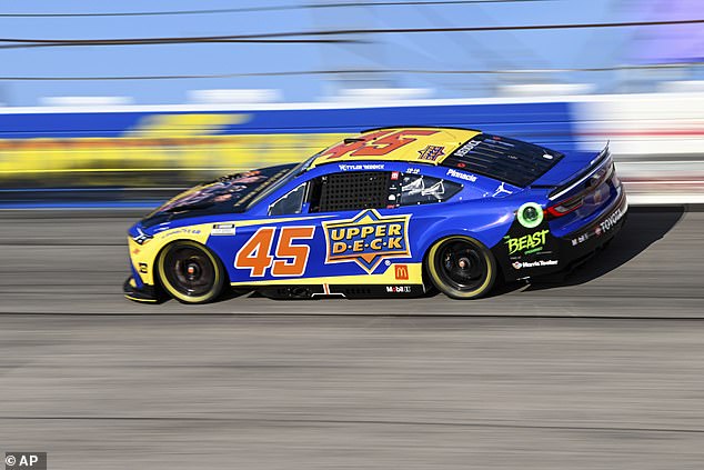 Tyler Reddick steers through Turn 1 during a NASCAR Cup Series car race at Darlington