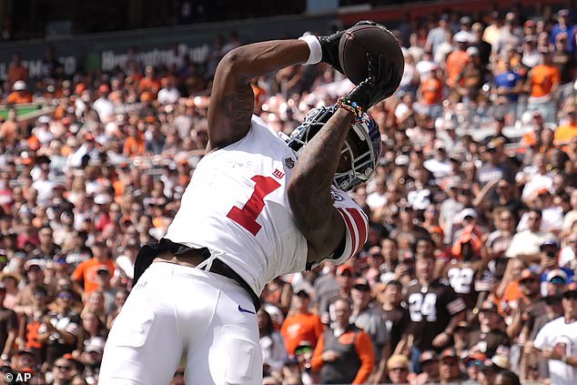 Malik Nabers catches a pass for a touchdown against the Cleveland Browns on Sunday