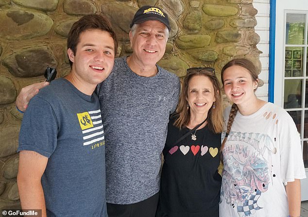 David Dryerman, 54, was driving his Tesla Model S on the Garden State Parkway with his wife Michele and 17-year-old daughter Brooke Saturday night when it veered off the road and struck a guardrail and a concrete barrier. Son Max, far left, was not in the car and is the only surviving member of the family