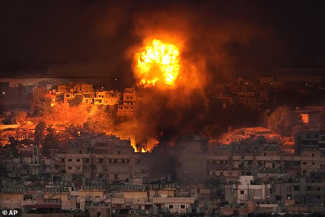 Flames rise after an Israeli airstrike in the southern suburbs of Beirut, Lebanon on Saturday