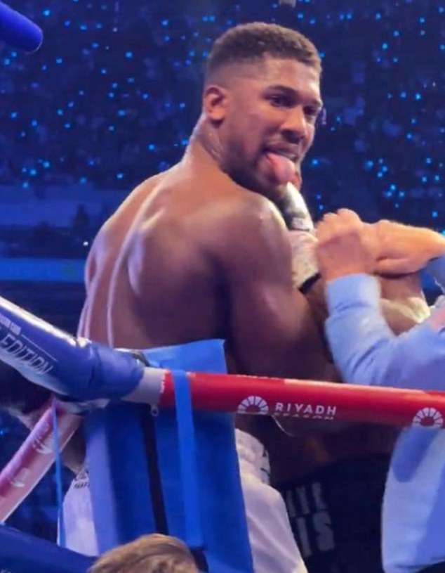 Joshua was caught sticking his tongue out at the crowd just before being knocked out in the fifth round