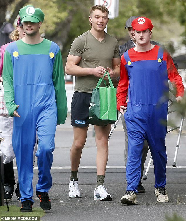 Lachlan Cowan (pictured left) dressed up as Luigi, but team-mate Patrick Cripps (centre) apparently ignored the memo about Carlton stars dressing up on Mad Monday