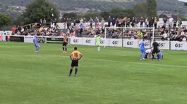 Folkestone Invicta striker Tom Derry was sent off after catching himself in a game of 'piggy' in the middle