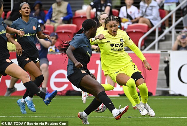 Washington Spirit forward Trinity Rodman (2) dribbles the ball against Portland Thorns FC