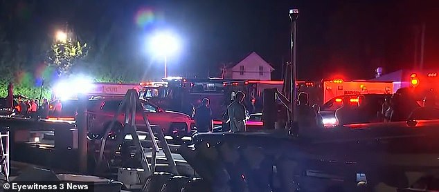 The high-speed crash broke the boat into pieces, throwing all passengers into the water, said Joey Kellems of the U.S. Coast Guard in the Long Island Sound sector (pictured: Search and rescue crews in the harbor)