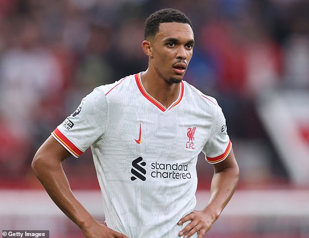 Paul Scholes has questioned whether Arne Slot 'may' Trent Alexander-Arnold (pictured)