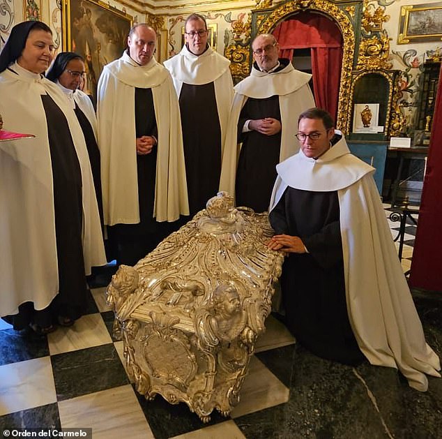 The Diocese of Avila in Spain has opened up the tomb of a medieval saint to conduct an analysis of the 450-year-old remains. Pictured: The silver marble coffin of Saint Teresa of Avila