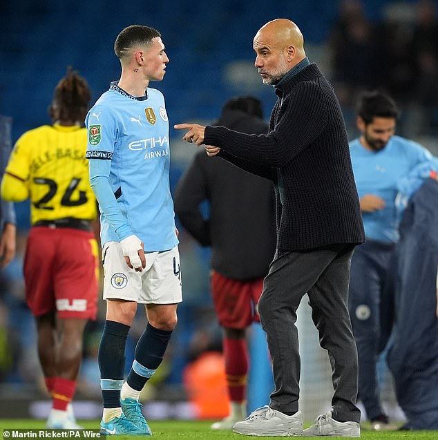 City manager Pep Guardiola (right) wanted to speak to Foden on the pitch after the match