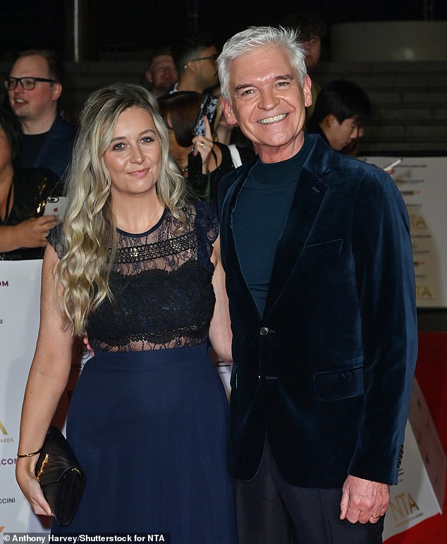 Phillip Schofield's daughter Molly emotionally declares she is 'proud to call him her father' in the latest episode of his Cast Away series (pictured with the presenter in 2022)