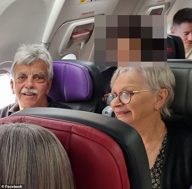 The couple is pictured on Thursday during their flight from Melbourne to Bali