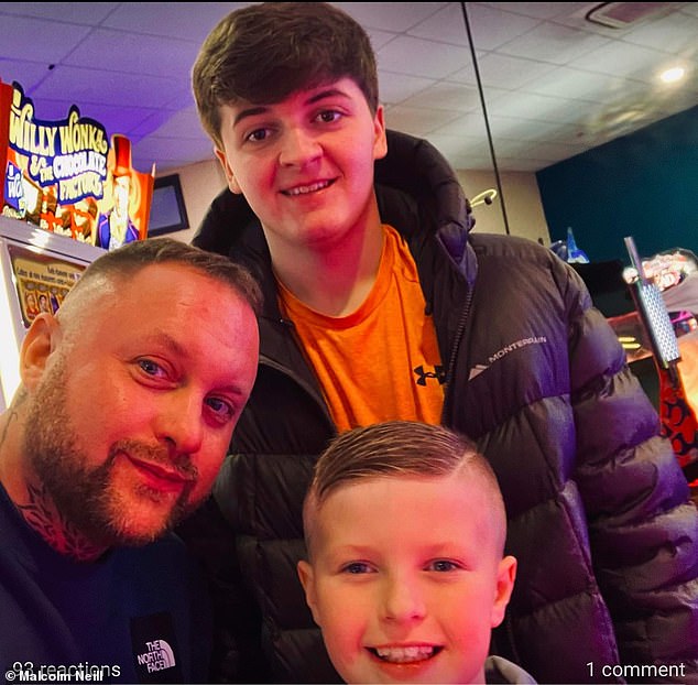 Chris Neill with his sons Reece and Archie, with whom he had been travelling