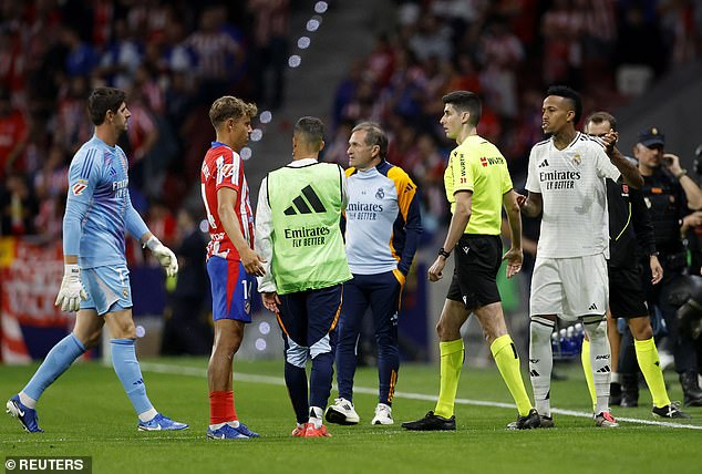 Play is SUSPENDED in the Madrid derby after Atletico Madrid