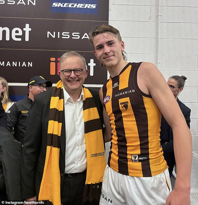 Prime Minister Anthony Albanese with Hawks star Calsher Dear after the elimination final