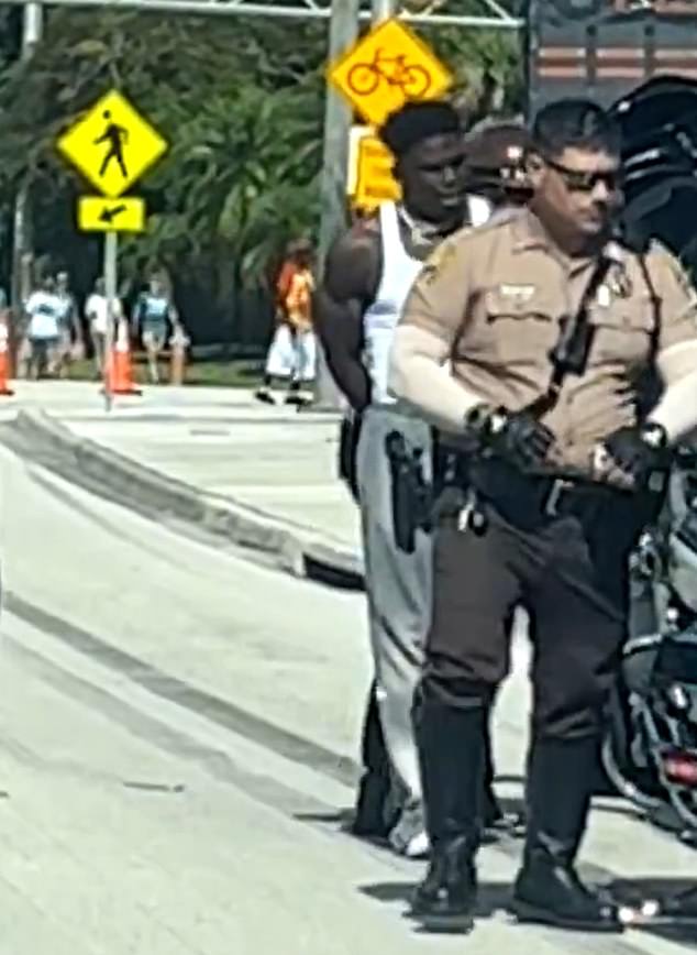 Miami Dolphins receiver Tyreek Hill was handcuffed and detained by police Sunday morning as he entered the team's Hard Rock Stadium