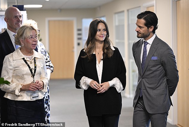 Princess Sofia of Sweden (centre) looked radiant as she stepped out alongside Prince Carl Philip (right) in the couple's second appearance since announcing their pregnancy.