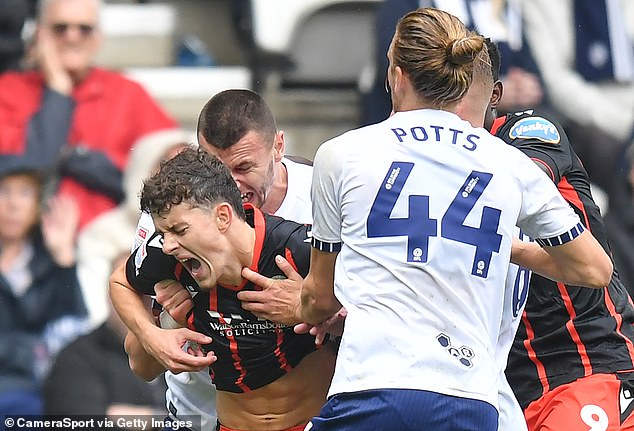 Preston striker Milutin Osmajic (left back) faces a lengthy ban after allegations he bit Blackburn left back Owen Beck (left)