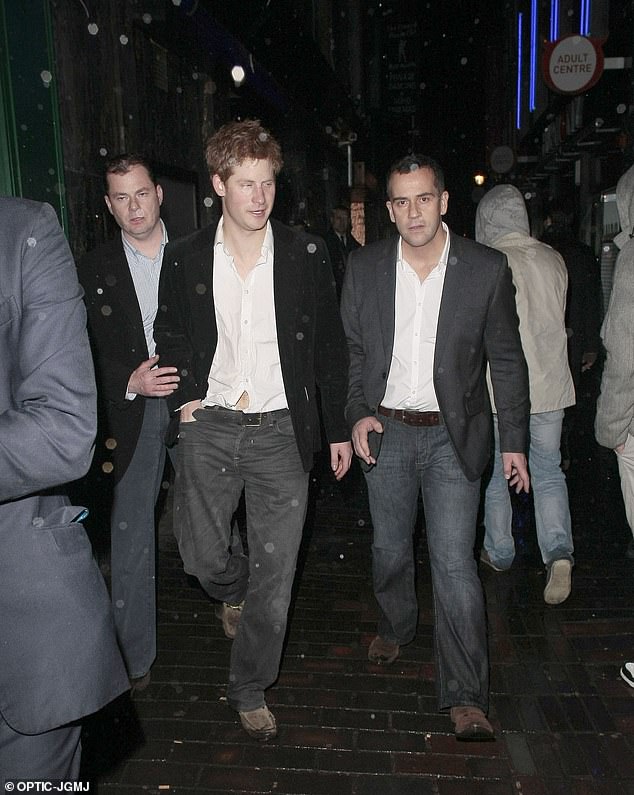 David Langdown has been by Harry's side for over a decade - seen here escorting the prince out of a Soho nightclub after a night out in 2011