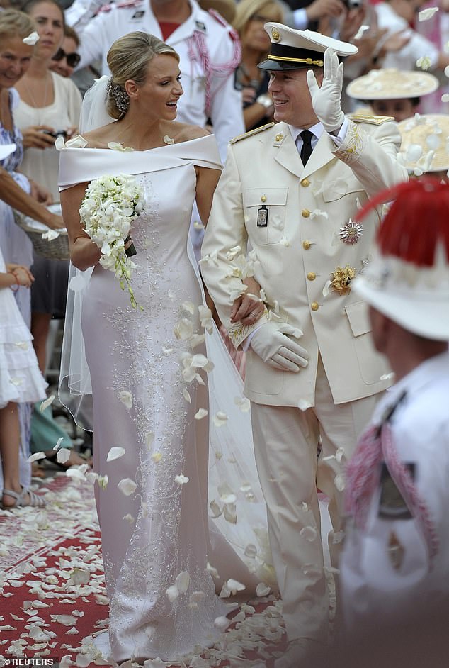 Prince Albert of Monaco revealed it wasn't love at first sight when he first met Princess Charlene (the couple are pictured on their wedding day in 2011)