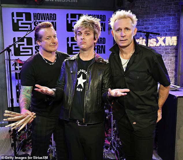 Green Day announced Thursday that they will return Down Under for their first Australian tour in eight years. Pictured from left: Tre Cool, 51, Billie Joe Armstrong, 52, and Mike Dirnt, 52