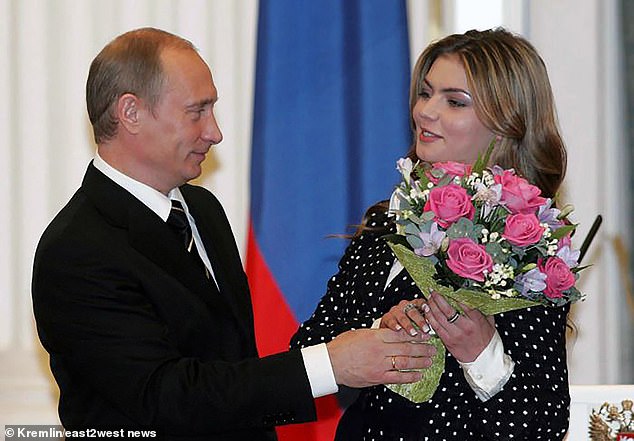 Vladimir Putin is said to have two sons with his glamorous gymnastics partner Alina Kabaeva, pictured right