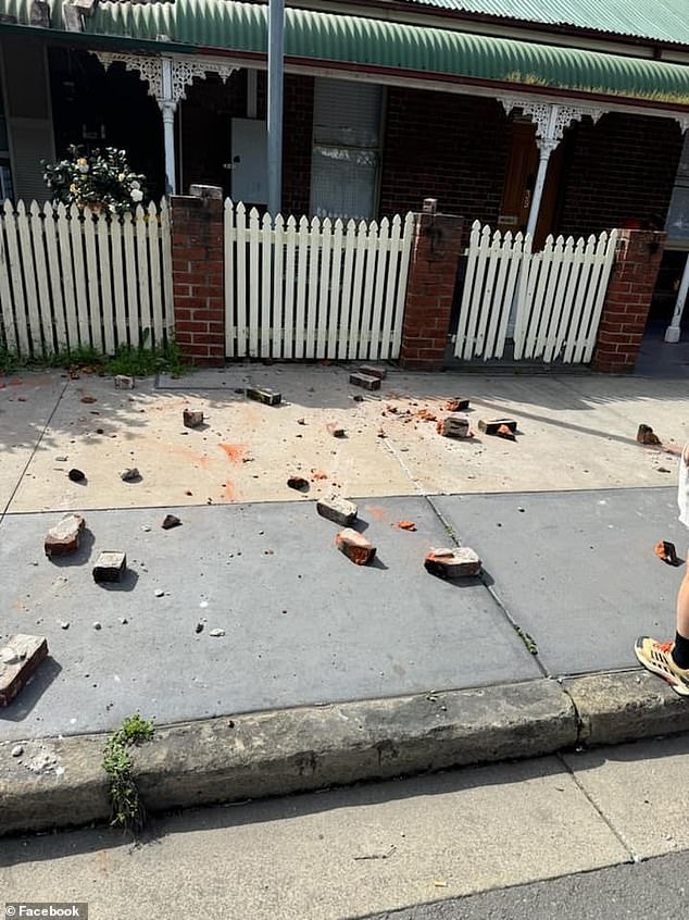 Hundreds of properties in the area were slightly damaged by the quake (debris can be seen on a footpath after the quake in Muswellbrook, northern New South Wales)