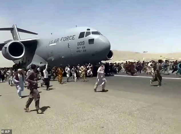 Panic broke out at Kabul airport on Monday as thousands of people rushed onto the runway in a desperate bid to escape Taliban rule, fearing bloody reprisals from the Islamists.