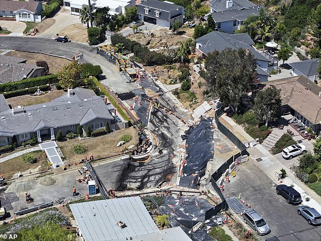 Rancho Palos Verdes, south of Los Angeles, has been called America's wealthiest retirement town, but now residents are facing one battle after another as landslides continue to take hold. (Photo: Damage to Dauntless Dr. in Rancho Palos Verdes)