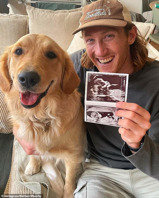 Nathan Murphy shared his pregnancy news with his golden retriever Juno