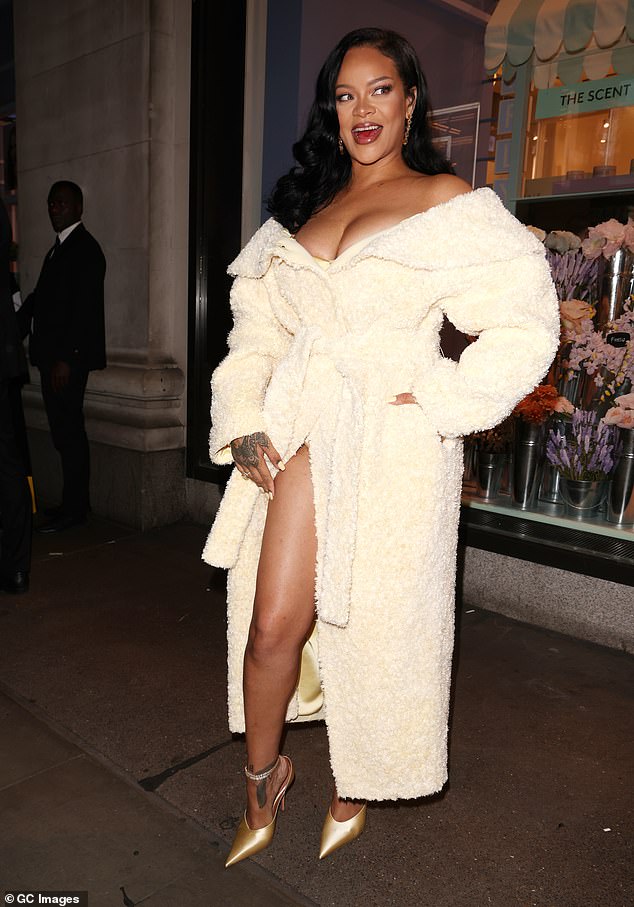 Rihanna opted for a white teddy coat as she attended her launch event at Selfridges in London