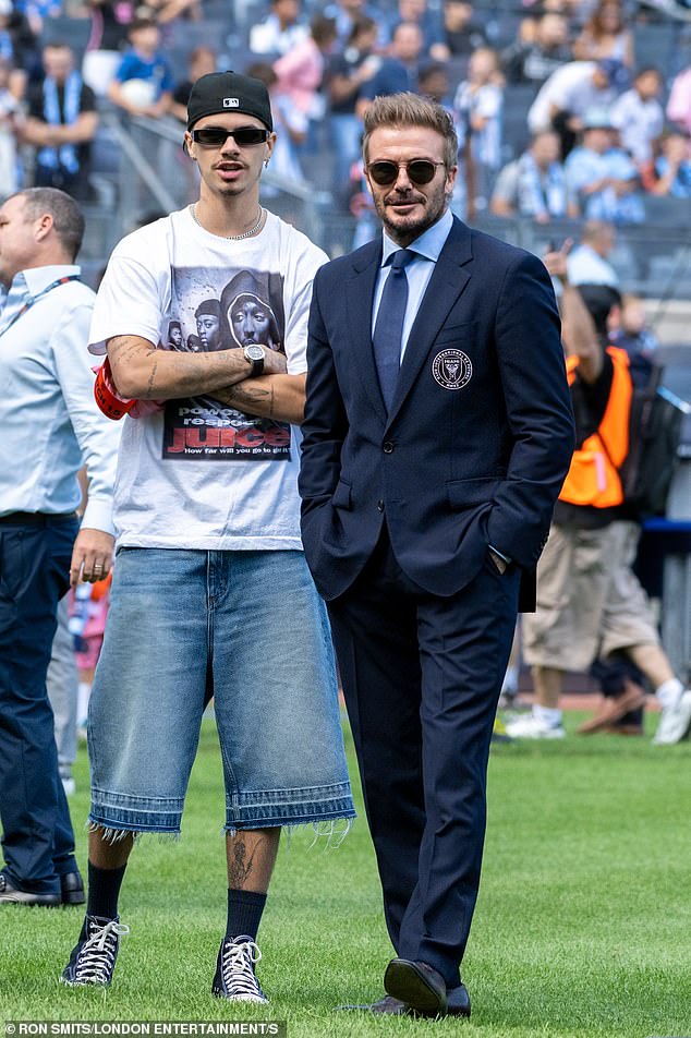 Romeo Beckham looked set to follow in his father David's footsteps as a manager as they were spotted together at the Inter Miami vs. New York City match on Saturday.