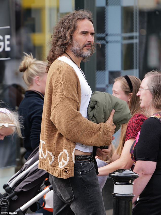 Russell Brand has been seen in public for the first time, reportedly being dropped from the Despicable Me film series after facing allegations of rape and sexual abuse