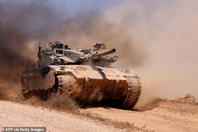 An Israeli army tank pictured in an area on Israel's southern border with the Palestinian Gaza Strip in June