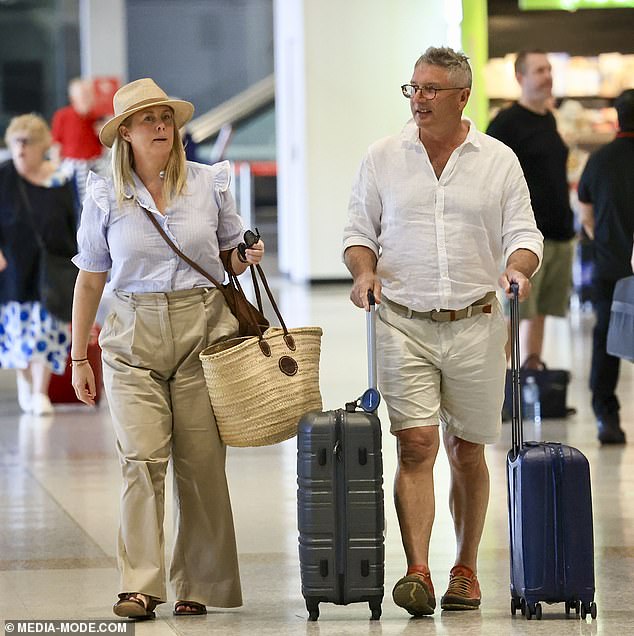 Samantha Armytage, 48, (left) and her husband Richard Lavender (right) looked fresh and cheerful last Thursday as they returned to Sydney after a day out in Noosa